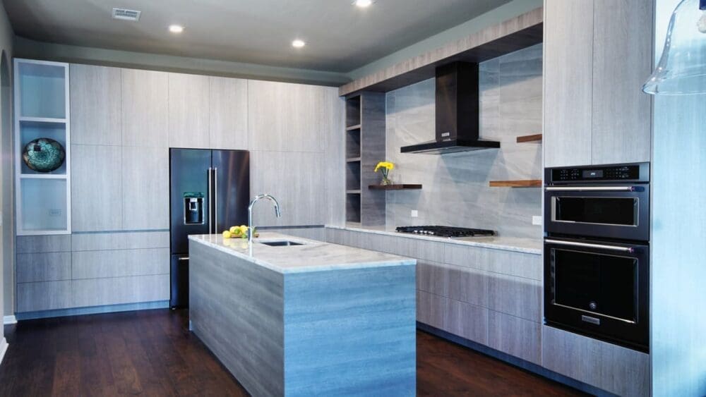 European Style Kitchen with contemporary appliances and gray woodgrain cabinets