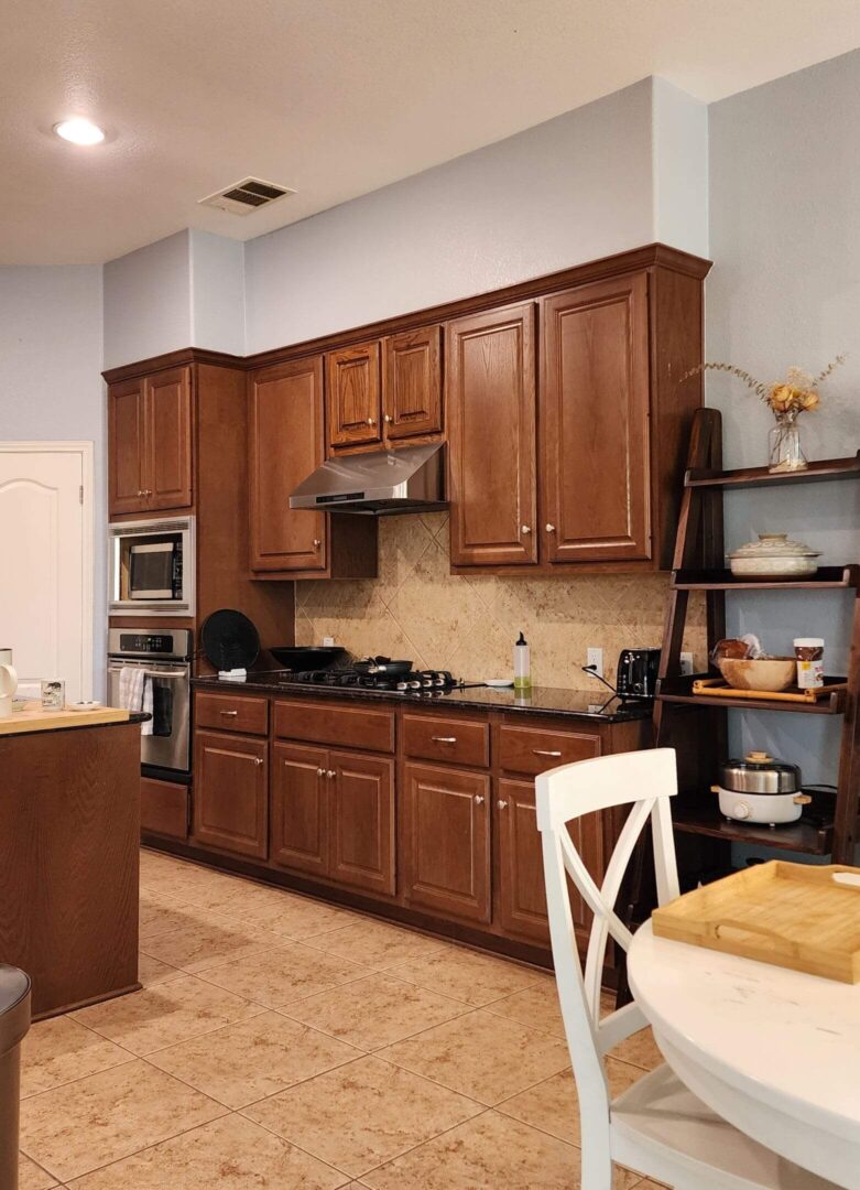 Before renovation picture of the kitchen cabinets.